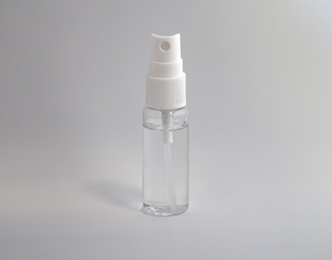Tick and flea control spray bottle for cats and dogs
